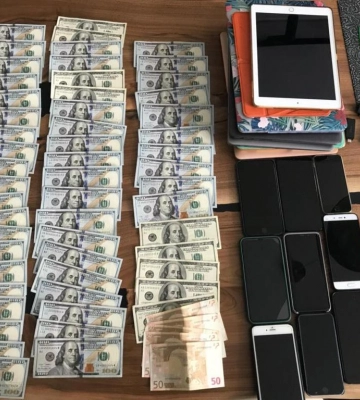 Около 50 млн грн и 830 кг серебра. В Киеве арестовали имущество дельцов, отмывавших деньги через криптовалюты – фото