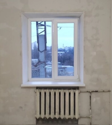 У Харкові відбудовують знищені російськими ракетами будинки