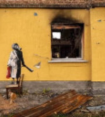 На Київщині повідомили про підозру чоловіку, який намагався вкрасти графіті Бенксі