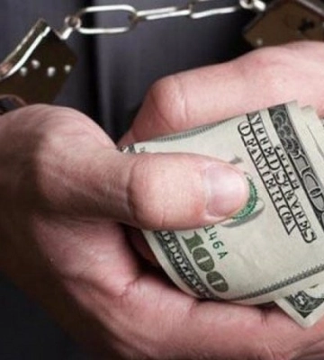 У Києві слідчий поліції вимагав 20 тисяч доларів у свідка справи
