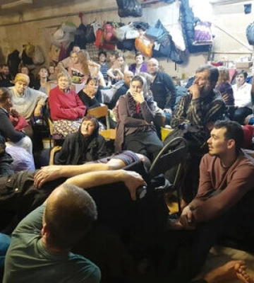 Березневе фото мешканців окупованого Ягідного в підвалі потрапило на обкладинку Time. ФОТО