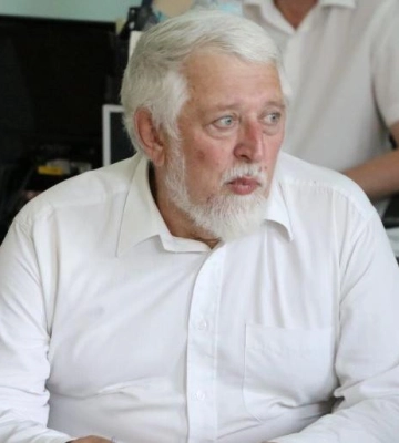 Голову комісії з перейменувань у Полтаві намагались виселити з будинку сусіди