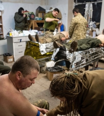 «Ангел бійців», або дівчинка з косичками: під Бахмутом загинула медикиня (фотогалерея)