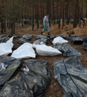 Найбільші масові поховання виявили на Харківщині й Київщині — поліція