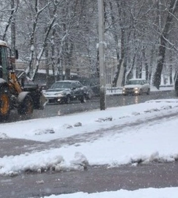 Квітнева хуртовина: Хмельницький замело снігом – фото та відео негоди