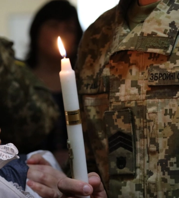 Хрещеними стали захисники: у Львові охрестили шістнадцятьох сиріт з Луганщини