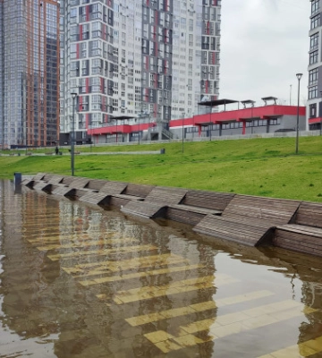 Киев в воде: как подтопило Оболонскую набережную и часть улиц, фото и видео