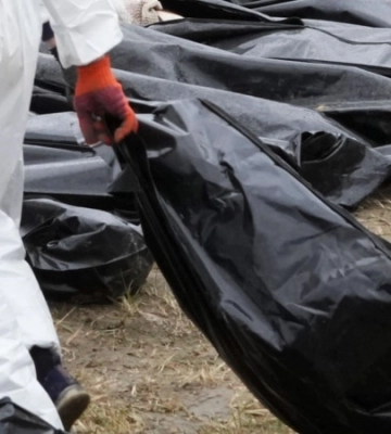 На Донеччині поліцейські виявили нові поховання вбитих окупантами цивільних та військових