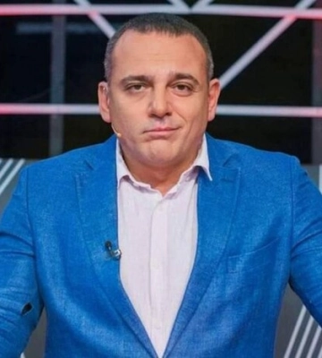 «Слуга» Бужанський відмовився спілкуватися українською та «напав» на ведучого (відео)