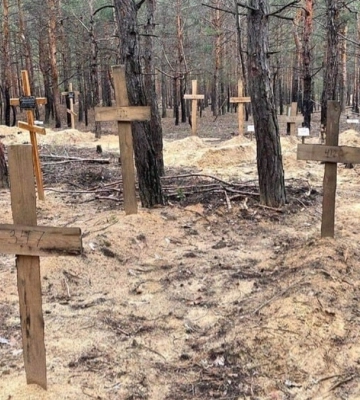 Досі не ідентифіковані 66 тіл з масового поховання в Ізюмі