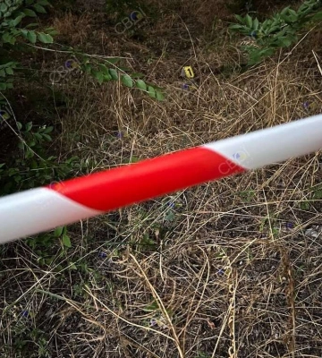 На Дніпропетровщині посеред вулиці знайшли мертву голу жінку