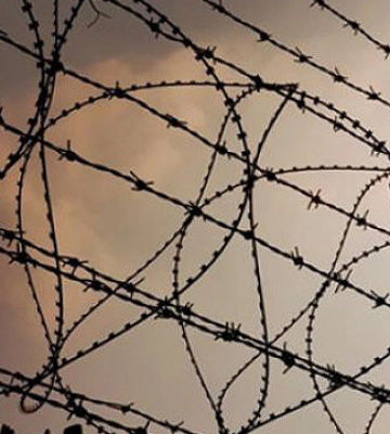 Від удару росіян в Оленівці загинули близько 40 українських полонених, поранені 130