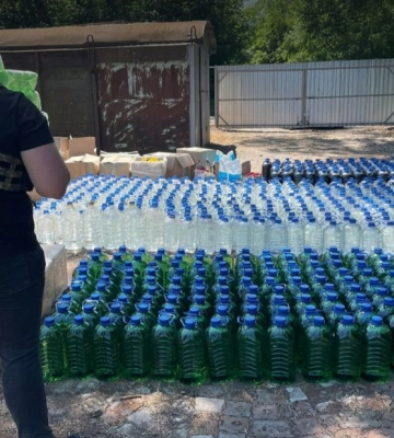Під Києвом у приватному будинку тисячами літрів виготовляли отруйний алкоголь