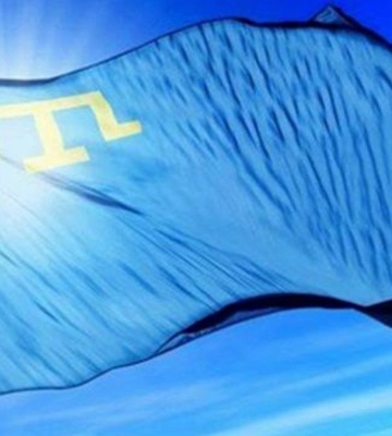 Окупанти затримали кримських татар за національні прапори