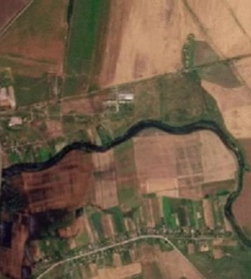 Росіяни звели дамбу біля окупованого Токмака — там розлилася річка. Bellingcat показав супутникові знімки