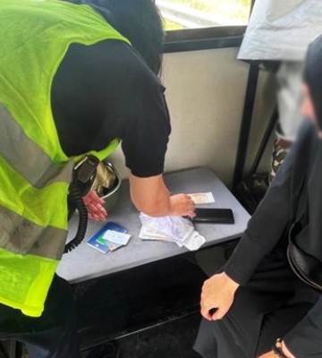 На в’їзді до Києва зупинили черницю з російськими рублями