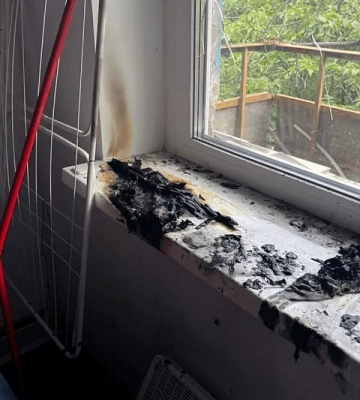 У Нікополі з пожежі в квартирі врятували дитину (ФОТО)