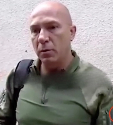 Генсек «Білоруського Червоного Хреста» з Z-символікою приїхав в окуповані Маріуполь і Лисичанськ