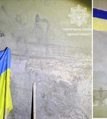 В Одессе задержан мужчина, который сорвал государственный флаг со здания и бросил на землю