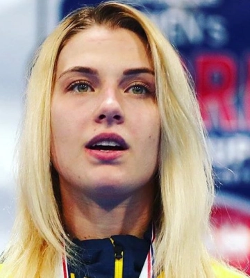 Через відмову потиснути руку росіянці Ольгу Харлан засипали погрозами у соцмережах