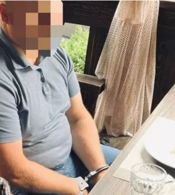 СБУ затримала у Рівному поліцейського, працівника військкомату та валютника