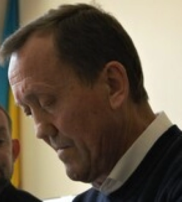 Заволодіння землею під Києвом: обвинуваченого примусово доставлять до суду