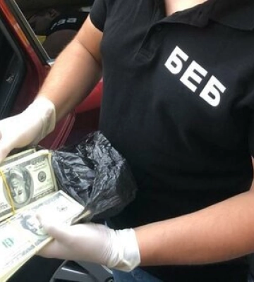 Підробляли долари старого зразка: У Києві викрили групу фальшивомонетників. ФОТО