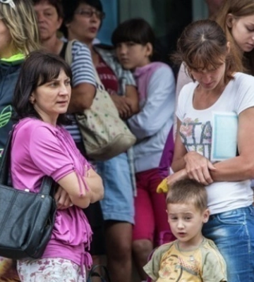 Половина українських біженців не хочуть жити за кордоном - опитування