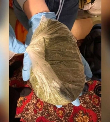 У жителя Кам’янського вдома знайшли кілограм марихуани