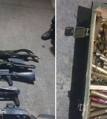 На Київщині військовослужбовець військкомату зберігав арсенал зброї та боєприпасів, фото