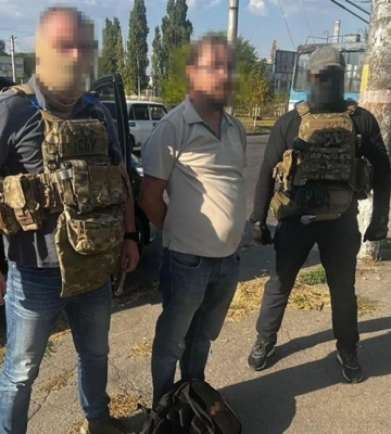 Херсонский священник тайно приторговывал оружием, оставшимся после бегства оккупантов (фото, видео)