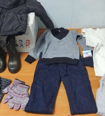 Як ВПО у Дніпрі безкоштовно отримати зимовий одяг для дітей