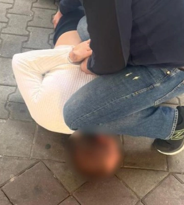 Поліцейські затримали чоловіка, який намалював російські прапори на опорах лінії електропередач та деревах у харківському парку 