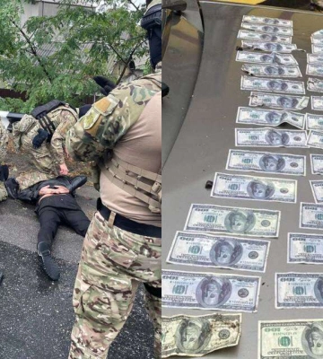 В Днепропетровской области двое мужчин требовали 11 тысяч долларов у отца погибшего военного
