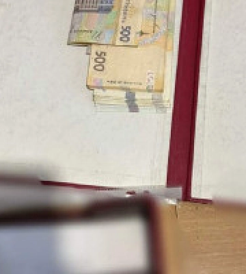 Керівницю відділення одного з інститутів Національної академії внутрішніх справ викрито на хабарі за успішну здачу сесії