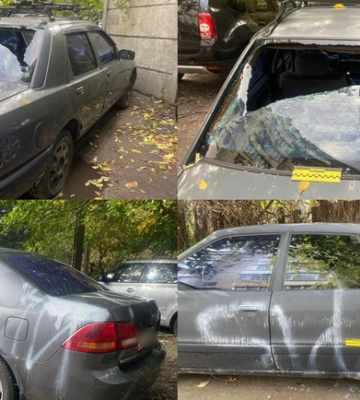 В Киеве установили хулиганов, которые из-за замечаний повредили и разрисовали восемь машин на Оболони. Фото