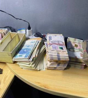 У Києві викрили мережу пунктів обміну валют з фальшивими доларами