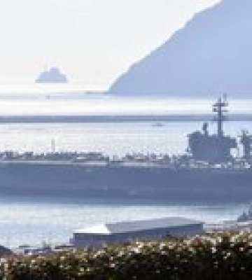 Ким Чен Ын получил со своего спутника фото военных баз США в Южной Корее – Reuters Ким Чен Ын получил со своего спутника фото военных баз США в Южной Корее – Reuters