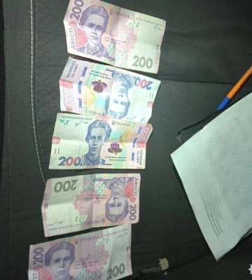 Поклав на заднє сидіння 1000 грн хабаря: житель Сарненщини хотів відкупитися від поліцейських