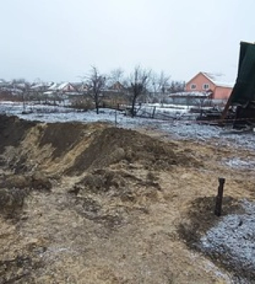 12-метровая воронка и поврежденные дома: последствия ракетной атаки РФ в Киеве, фоторепортаж