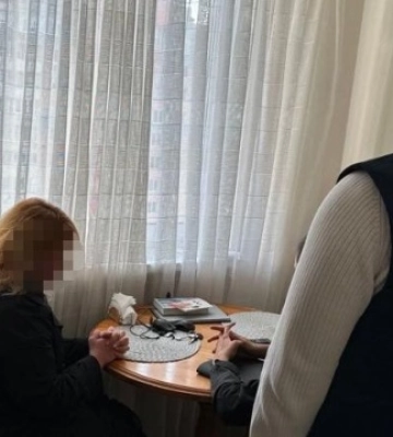 Судитимуть посадовицю столичної РДА, яка вела соцмережі Азарова