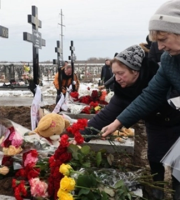 У Харкові попрощалися з родиною Путятіних, загиблих у вогні 9 лютого