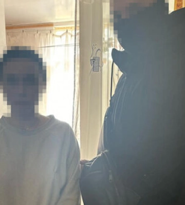 Затримано зрадницю, яка займалася примусовою паспортизацією жителів Херсона під час окупації, - СБУ. ФОТО