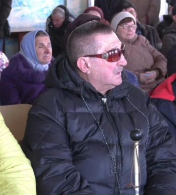 Узрите путина: в Мелитополе члены рашистского избиркома взялись за незрячих 