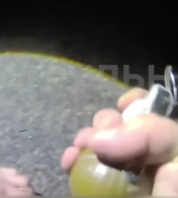 У Харкові нетверезий водій BMW погрожував поліцейським гранатою (відео)