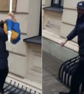 В центре Риги неизвестный сорвал украинский флаг