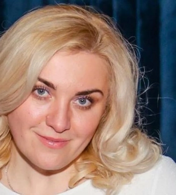 Директорка київської гімназії, яка корегувала вогонь росіян, втекла з країни