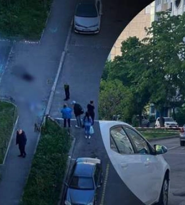 В Киеве девушка выпрыгнула с балкона многоэтажки и упала на прохожего