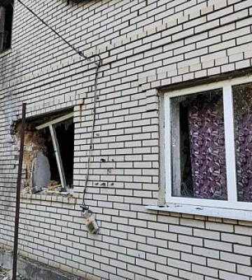 От вражеского обстрела в Никополе пострадала пожилая женщина