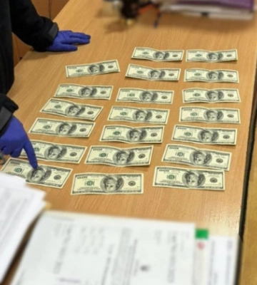 Требовал $2 000 за оформление инвалидности 70-летней бабушке: на взятке задержали чиновника больницы на Киевщине